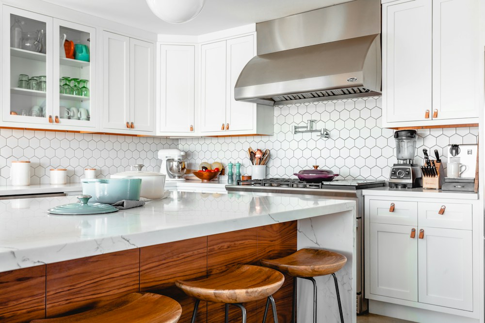 Neatly arranged kitchen with clean worktops and cabinets